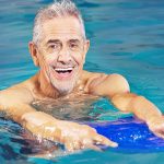 Happy Older Gentleman in Pool